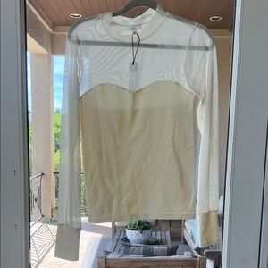 a loves a NWT CREAM SHEER BLOUSE WITH STRETCHY RIBBED COTTON BODICE, size Large